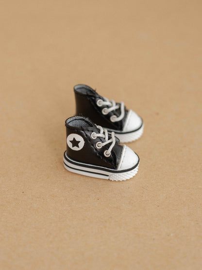 Black Sneakers with a Star