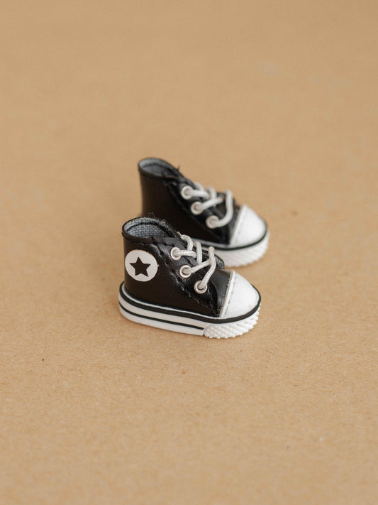 Black Sneakers with a Star
