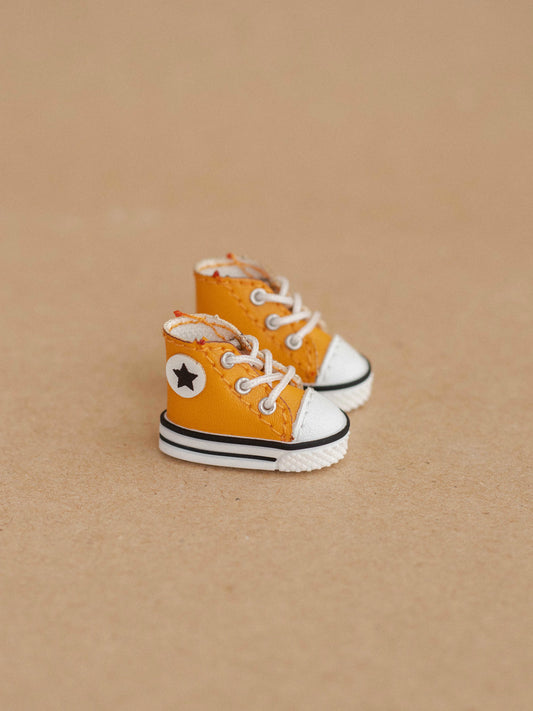 Yellow Sneakers with a Star